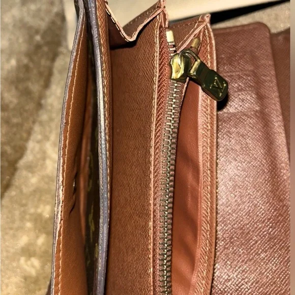 LOUIS VUITTONPortefeuille Alexandre Trifold Wallet w/ Dust Bag.